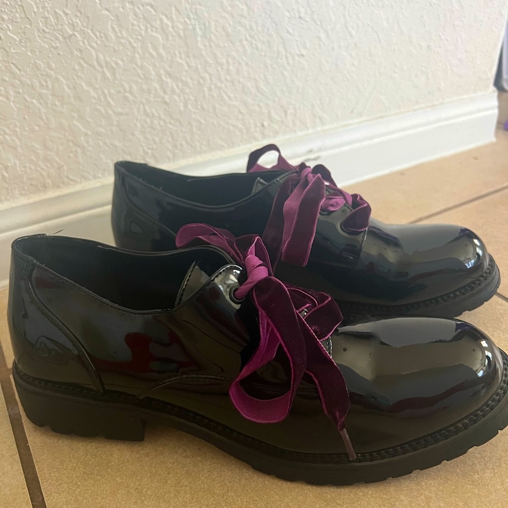 Dark coquette loafers with dark purple velvet lace